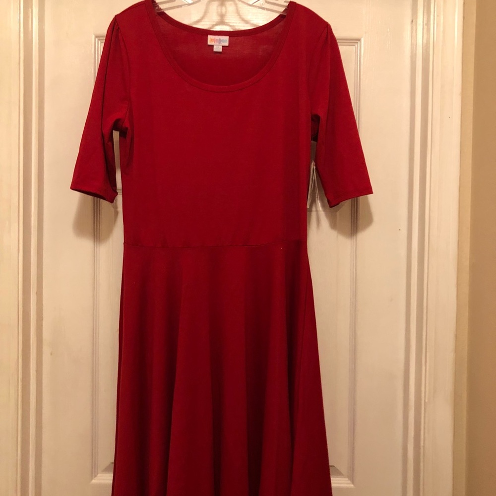 Beautiful true red Nicole dress by LulaRoe